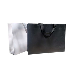 Pack 100 Bolsas Couché 40x30x9 cm Blanca o Negra